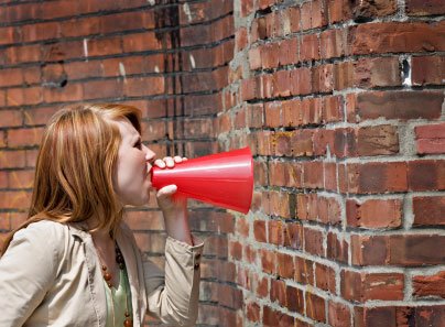 girl-shouting-at-brick-wall.jpg