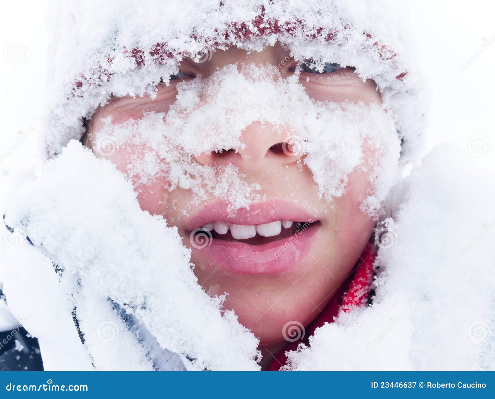 portrait-child-covered-snow-23446637.jpg