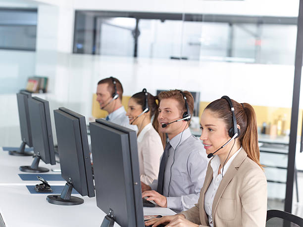 happy-call-center-operators-picture-id510323168