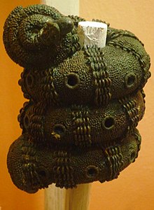 220px-Bronze_ornamental_staff_head%2C_9th_century%2C_Igbo-Ukwu.JPG