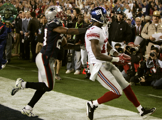 670b67dbe4c575a4e2289dbfd4c4679e-getty-fbn-super_bowl-giants-patriots.jpg