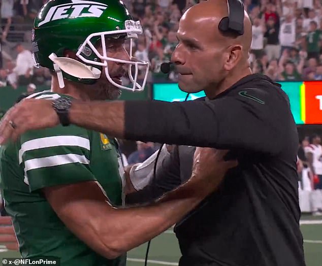 89896115-13873319-Aaron_Rodgers_and_Robert_Saleh_had_a_seemingly_tense_moment_duri-a-1_1726833553776.jpg