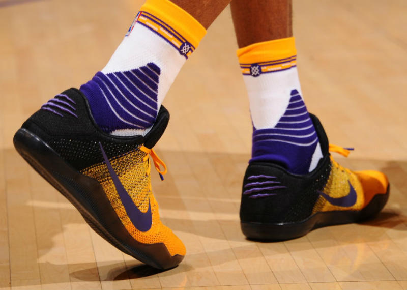 kobe-bryant-nike-kobe-11-black-yellow-purple-pe-2_o2uz9i.jpg