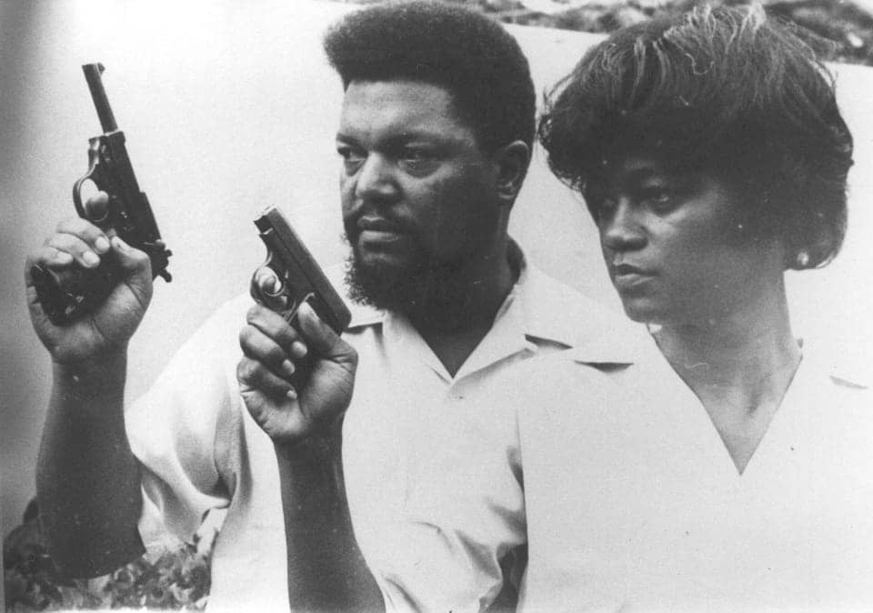 Robert-and-Mabel-Williams-with-guns.jpg