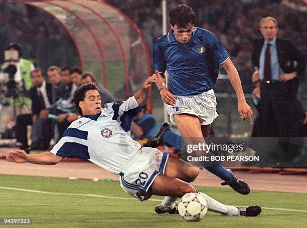 italian-defender-paolo-maldini-is-tackled-by-us-midfielder-paul-caliguri-during-their-90-soccer.jpg