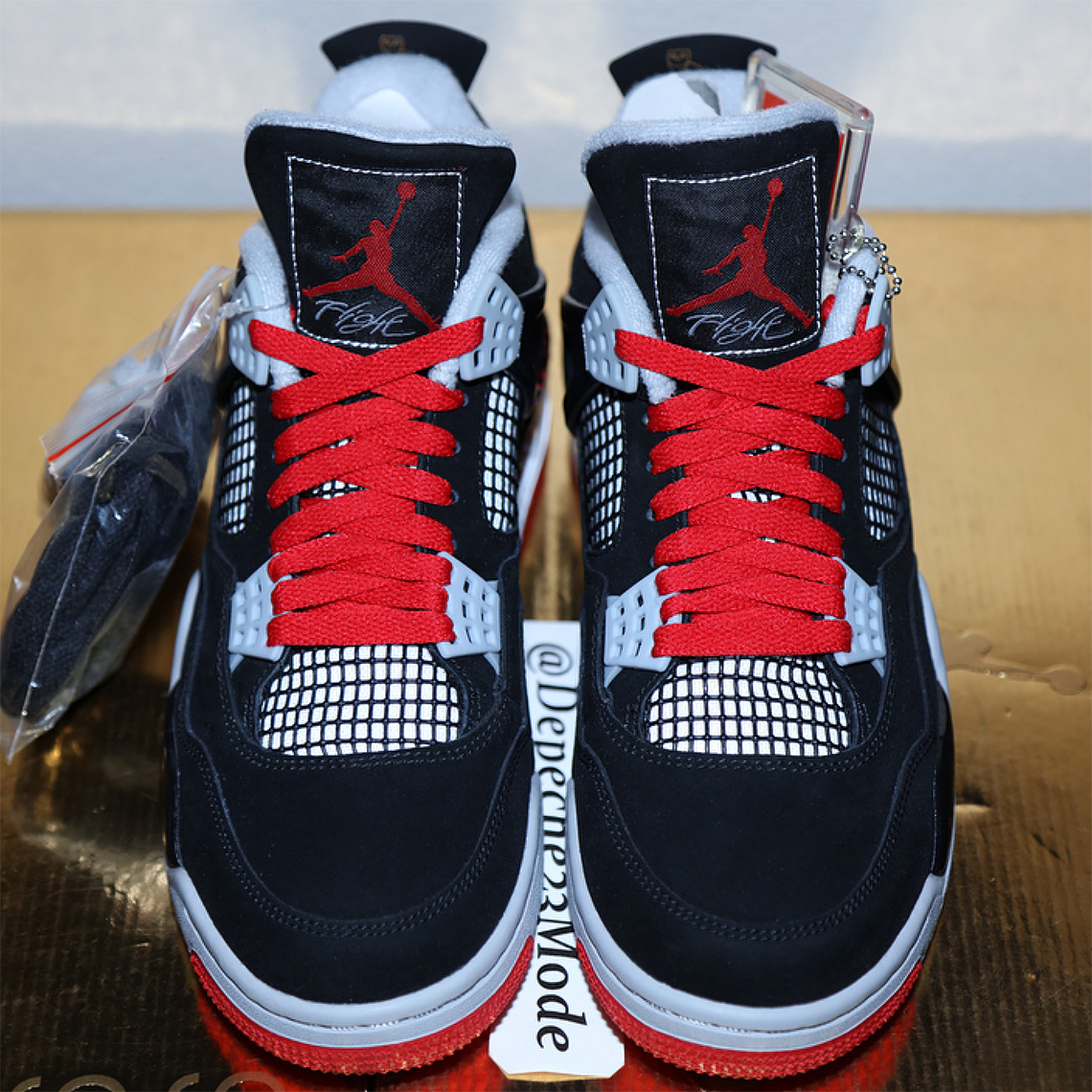 air-jordan-4-drake-bred-black-red-splatter-4.jpg