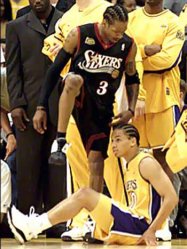 iverson-stepping-over-tyronn-lue.jpg