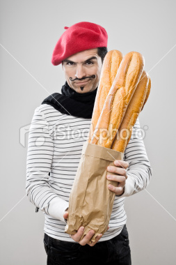 ist2_8514665-frenchman-with-french-baguettes.jpg